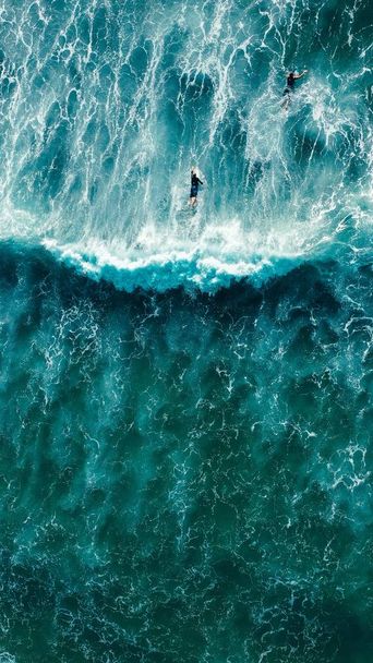 water splash in the ocean and surfers - Foto, Imagen