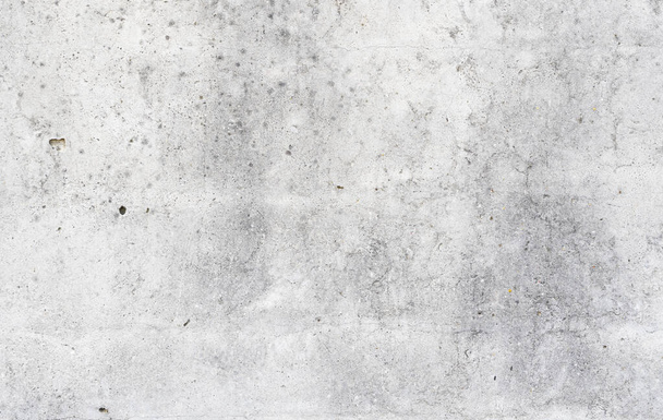 Texture of old concrete wall for background. White concrete wall background with a cracks nad holes. - Photo, Image