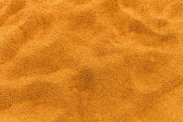 Praia de areia. Textura de areia detalhada
 - Foto, Imagem