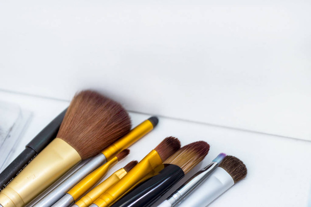 Much brushes for applying makeup in the dressing room - Φωτογραφία, εικόνα