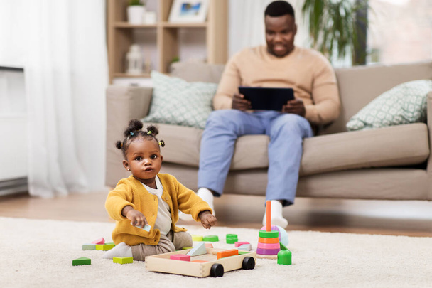 african baby girl playing with toy blocks at home - Photo, Image