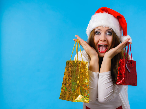 Happy Christmas woman holds gifts bag - Foto, Imagem