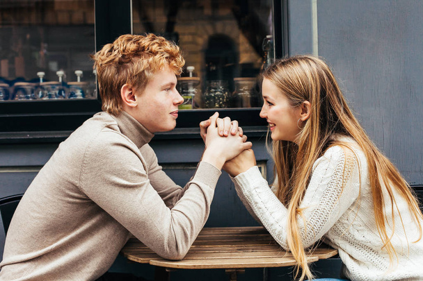 Portrait of a young couple in love in a cafe - Foto, Imagem