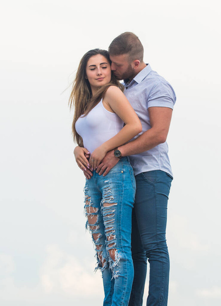 True love. Cute relationship. Man and woman cuddle nature background. Supporting her. Family love. Devotion and trust. Couple in love. Together forever we two. Love story. Romantic relations - Foto, Bild