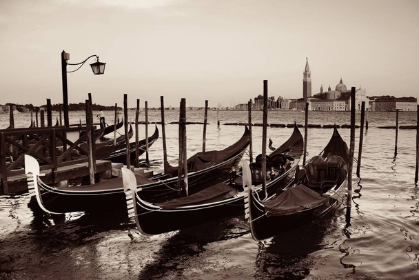 Gondola park in water and San Giorgio Maggiore island in Venice, Italy. - Foto, Imagem