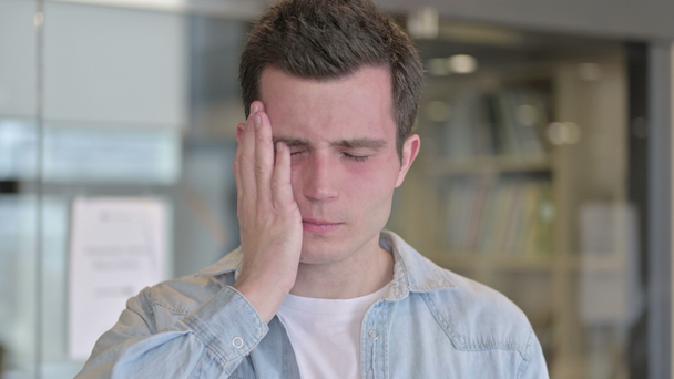 Portrait of Tired Young Designer having Headache - Filmati, video