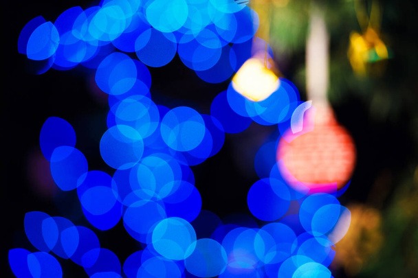 Blurred background of Christmas and New Year's toys on the Chris - Fotó, kép