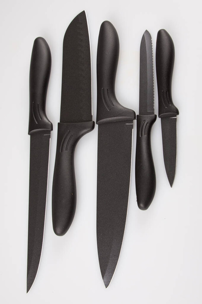 black kitchen knives set isolated against white background - Photo, Image