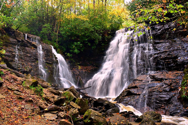Soco Falls In Jackson County, North Carolina is a beautiful, double waterfall on the edge of the Cherokee Indian Reservation, located between the towns of Maggie Valley and Cherokee. south of the Blue Ridge Parkway (at Soco Gap at Milepost 455.7) - Photo, Image