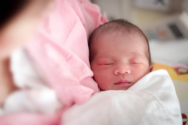 Close up and selective focus of one day old baby - 写真・画像