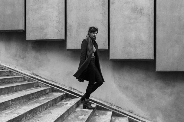 Beautiful young woman at the stairs - Valokuva, kuva