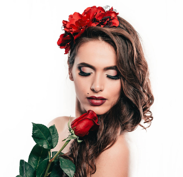 portrait of a gorgeous woman with a red rose - Zdjęcie, obraz