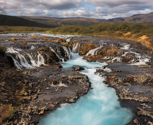 Gyönyörű türkiz Bruarfoss vízesés, Izland  - Fotó, kép