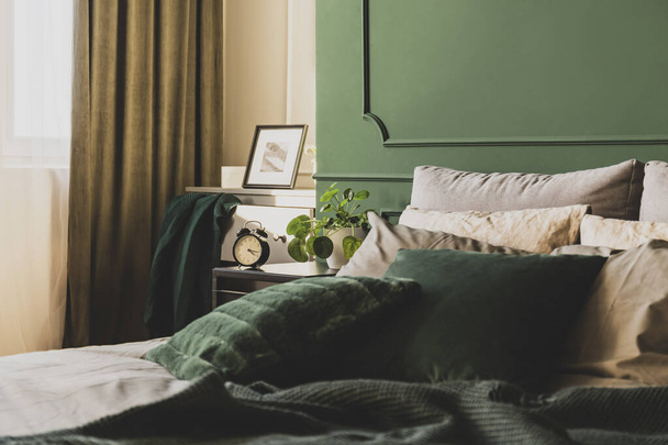 Dark green trendy interior design in fashionable apartment, copy space on empty wall - Фото, зображення