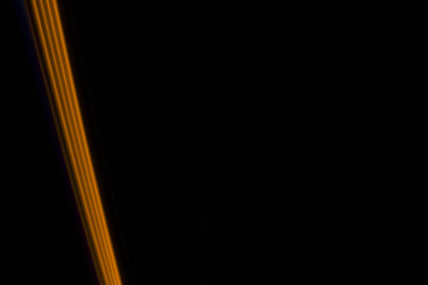 yellow  light lines on a black background - Photo, Image