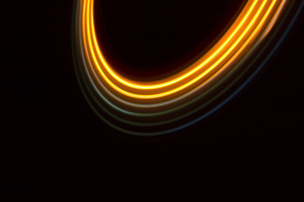 yellow light circles on a black background - Foto, Imagem