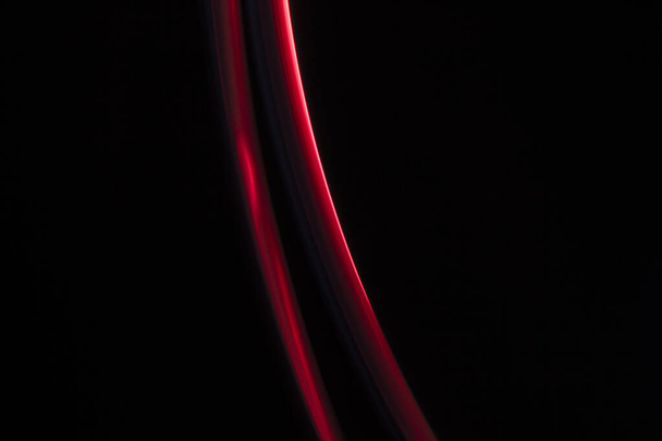 red light lines on a black background - Foto, Imagen
