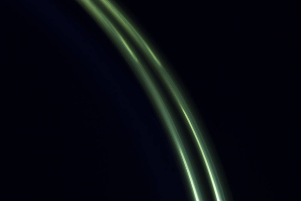 green  light lines on a black background - Photo, image