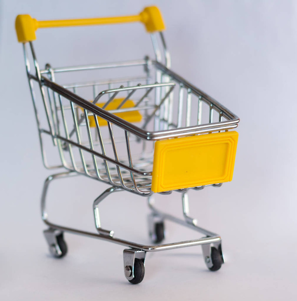  Shopping cart close-up. Isolated. Sales - Photo, Image