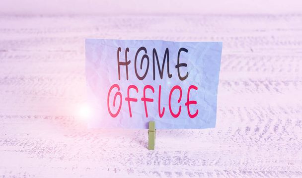 Word writing text Home Office. Business concept for space designated in a demonstrating s is residence for official business Green clothespin white wood background colored paper reminder office supply - Fotoğraf, Görsel