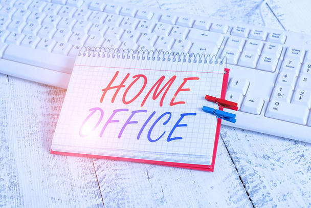 Handwriting text writing Home Office. Concept meaning space designated in a demonstrating s is residence for official business notebook paper reminder clothespin pinned sheet white keyboard light wood - Photo, Image