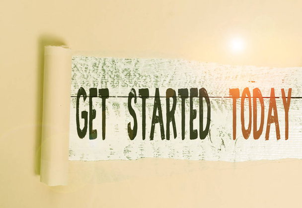 Writing note showing Get Started Today. Business photo showcasing lets do it Dont hesitate Now or never Get going No delay Cardboard which is torn placed above a wooden classic table. - Photo, Image