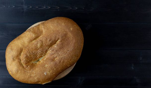 Pita bread on a wooden background - 写真・画像