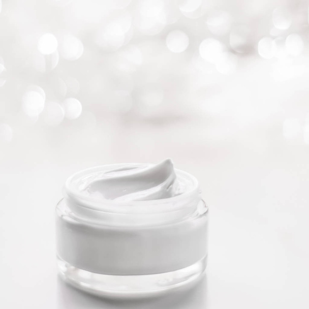 Facial cream moisturizer jar on holiday glitter background, mois - Photo, Image