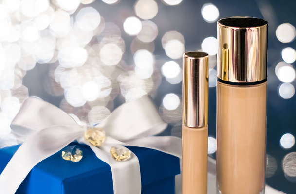 Holiday make-up foundation base, concealer and blue gift box, lu - Фото, зображення