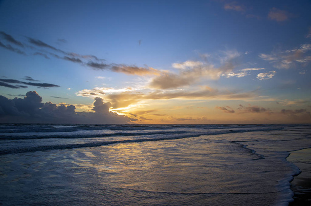 A sunrise at the beach. - Valokuva, kuva