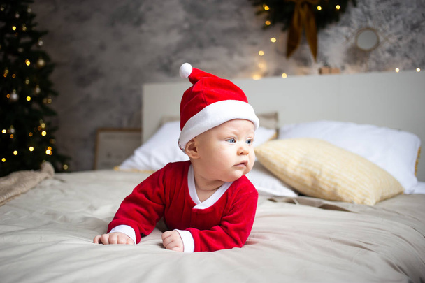 little boy with Santa costume at home - Foto, Bild