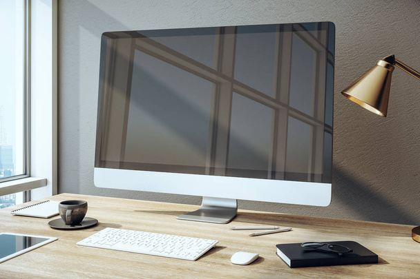 Stylish designer desktop with empty computer - Фото, зображення