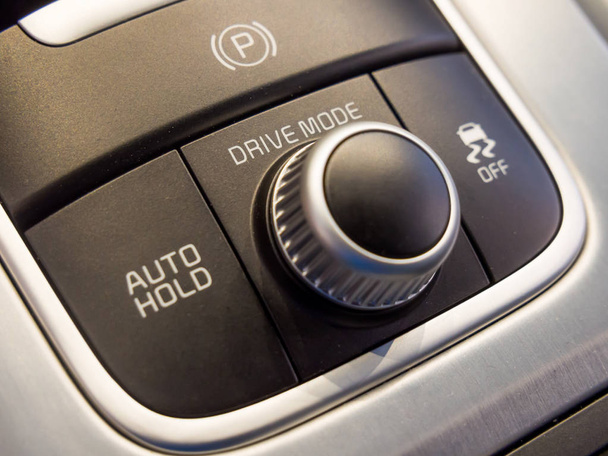 Passenger drive mode selection dial and lock button - Photo, Image