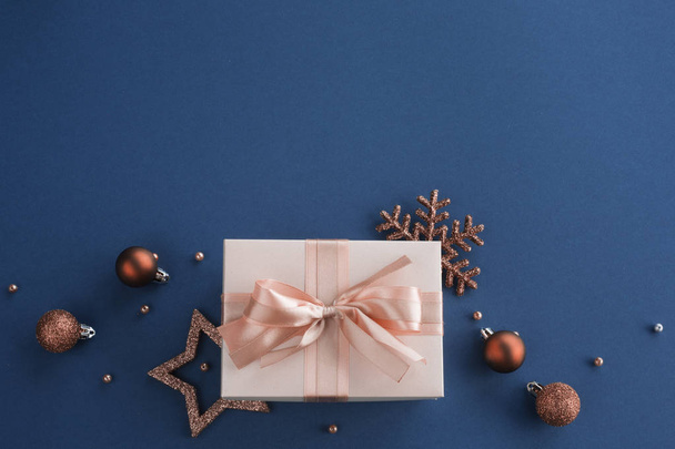 Christmas gift on blue background - Photo, Image