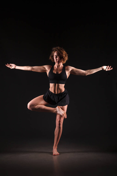 Yoga girl in photo studio - Fotó, kép