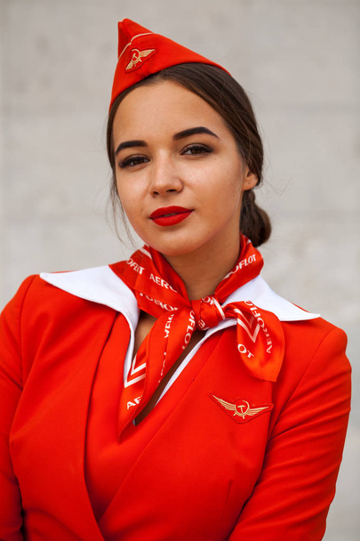 RUSSIA, SAMARA: 08 AUGUST 2019. Sexy stewardess dressed in offic - 写真・画像
