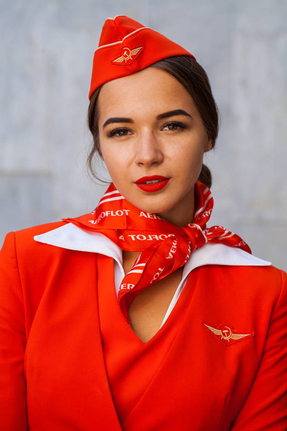 RUSSIA, SAMARA: 08 AUGUST 2019. Sexy stewardess dressed in offic - Zdjęcie, obraz