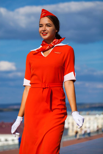 RUSSIA, SAMARA: 08 AUGUST 2019. Sexy stewardess dressed in offic - Foto, Imagen