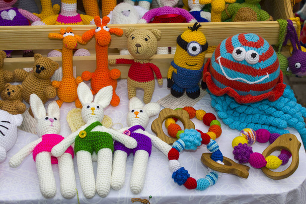 Toys made of knitted threads. Colourful handmade crochet animals. Soft toys.Children's toy. Crochet pattern. Handicraft manufacturing. - Photo, Image