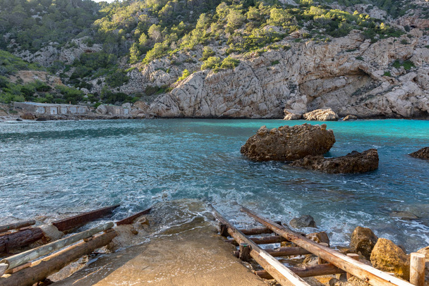 Turquoise waters in Es Portitxol, Ibiza, Spain. Hidden bay on the Island of Ibiza, in Sant Joan de Labritja. - Photo, Image