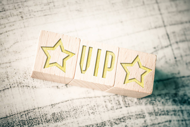 The Word VIP With Two Stars On Wooden Blocks On A Table - Photo, Image