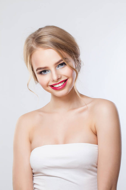 Cheerful smiling girl on white - Zdjęcie, obraz