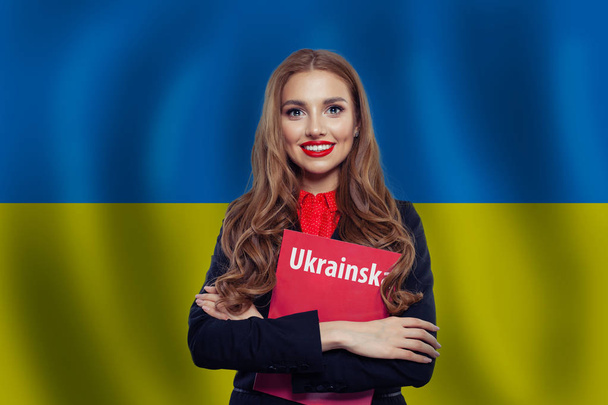 Ukraine concept. Pretty smiling brunette woman  - Foto, afbeelding