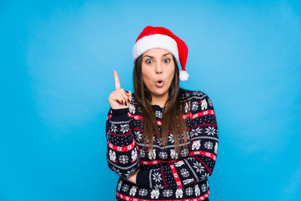 Young woman celebrating christmas day - Foto, Imagen
