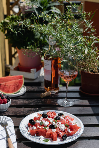 Beautiful healthy lunch, feta cheese, watermelon, blackberry, mi - Фото, изображение