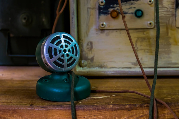 Old vintage microphone in a old studio, Audio broadcasting and recording equipment - Photo, Image