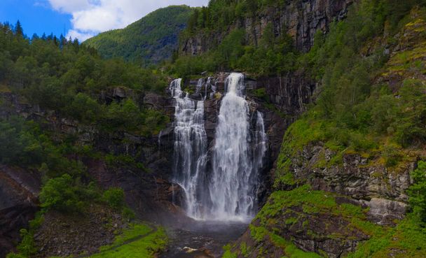 Frontal view of the Skjervsfossen in summer, seen from the base. Norway. - Photo, Image