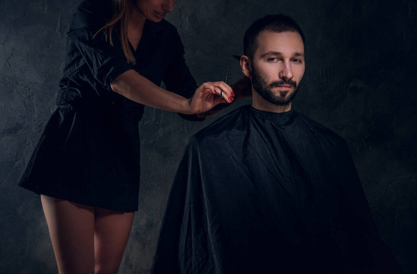 Concept of barbershop - male have a hair cut - Фото, изображение