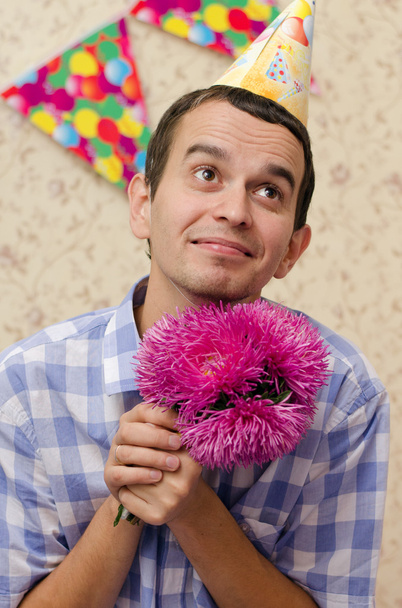 hombre feliz con flores
 - Foto, imagen