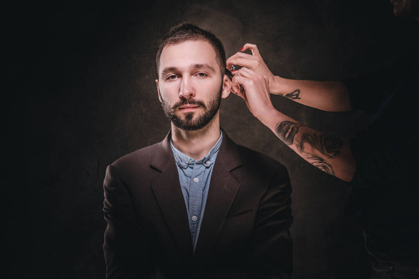 Az elegáns férfi portréja, akinek szakálla van - Fotó, kép